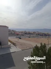  3 تملك الان شقة الاحلام بالعقبه تاسعه، اسعارمنافسه،وتشطيبات فلل،وموقع اطلاله بحريه دائمه ومقابل خدمات