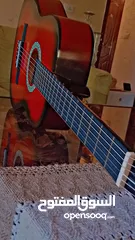  2 جيتار nailon احمر بحالة ممتازه، استعمال بسيط جدا