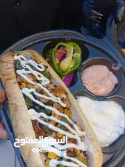  2 مطعم شاورما وسناكات وبرغرات للبيع او للضمان