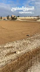  2 قطع اراضي قرب الشارع الرئيسي ارينبة الغربية بالقرب من مسجد خلف المحاكيم شارع المطار
