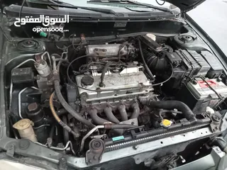  6 ميتسوبيشي كولت 2003 المكينه فيول 1.6  Mitsubishi colt 2003 fuel injector