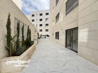  19 شقة طابق شبه ارضي للبيع مساحة 200م مع ترس وحديقه وكراج 250م بأجمل مناطق خلدا (مشروع 114