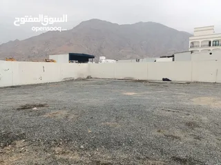  2 Industrial land for rent in Al misfah with a boundary wall and a guard room أرض صناعية مسورة المسفاة