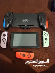  2 نينتندو سويتش مع 5 العاب وأيد و شاحن