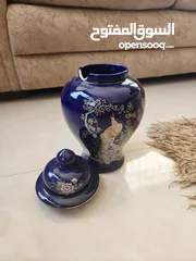  9 فاز انتيك قديمه لون ازرق رسمة طاووسين مذهبين يوجد كسر خفيف غير مؤثر على الشكل العام(نوادر)