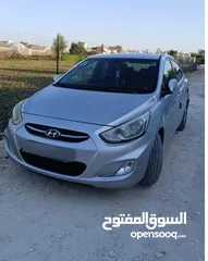  1 هونداي اكسنت 2012 ممتازه بدون حوادث ديزل السيارة واقتصادية جدا جنط مغنيسيوم ،فرش جلد شاشة كبيرة مكيف