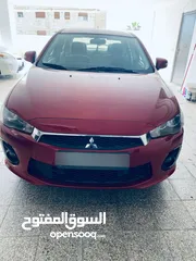  1 ميتسوبيشي لانسر خمري موديل 2017 نظيفة وكالة كرت ابيض7777 جيد فحصها  ... لقطة بسعر حررررررررررق
