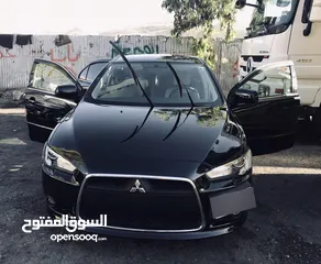  1 ميتسوبيشي لانسر رياضي ماتور 2000cc