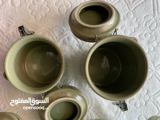  5 4pcs ceramic canister set with wooden spoons - طقم علب سيراميك متكون من 4 قطع مع ملاعق خشبية