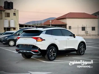  6 كايا سبورتاج  2022 فل الفل فتحة سقف  2x4 ///240Hp بنزين + كهرباء  ( Haybrid) 1600cc