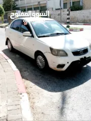  1 كيا ريو 2009