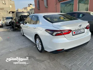  4 camry 2023 white colour  daily and weekly rent