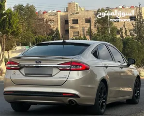  10 فورد فيوجن موديل 2017 لون شمباني كلين