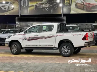  7 تويوتا هايلكس S-GLX اعلى المواصفات باللون الابيض المميز 2024