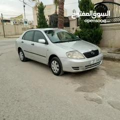  5 كورولا بيكومون 2003بسعر مغري قطارة بنزين