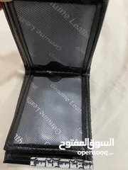  12 محفظتين رجالي جداد المحفظه