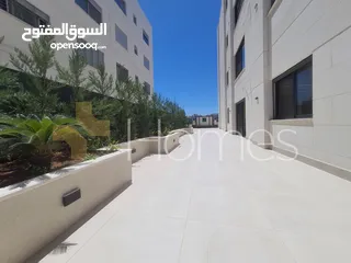  2 شقة ارضية مع حديقة للبيع في قرية النخيل بمساحة بناء 220م