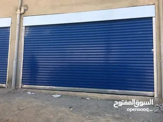  4 صيانة وحدادة أبواب المخازن التجارية و الكراجات كهرباء وعادي