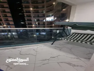  11 للايجار الشهري شقة غرفتين و صالة مفروشة في أبراج الواحة في عجمان بمنطقة الراشدية