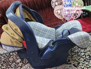  10 أغراض أطفال للبيع  عربية مشايه سرير كرسي سيارة زحليقه والعاب