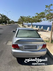  4 Mitsubishi Lancer  متسوبيشي لانسر