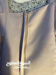  8 ‏فستان أعراس أو خطبة لونه زهري من الأمام قصير ومن الخلف طويل و من الامام مطرز عليه لولو و ستراس