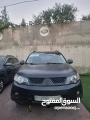  3 ميسوبيشي اوتلاندر 2009.  7ركاب   اصل برايفت  لون اسود مط   تشقيل بصمة  فتحة س
