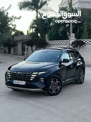  1 توسان هايبرد (  hybrid plug-in N-Line )  اوتوماتيك فل مواصفات بانوراما 4*4  بمشي 65 ك عالشحنه