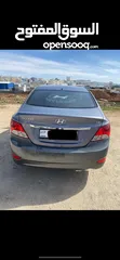  2 هونداي اكسنت موديل 2014 لون فيراني بحالة ممتازة فحص 4 جيد