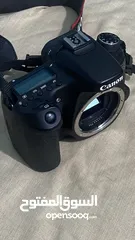  5 كاميرا كانون مع عدسة EFS 18-200mm الاصلية