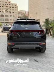  14 هونداي توسان ترخيص 2022 محرك 1600 هايبرد plug in/يقطع على الشحنه 65 كيلو متر  271 حصان