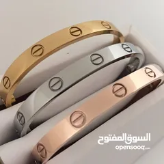  14 Carter طقم أساور كارتير  مكفول لون سنتين  3 أساور ( فضي - نحاسي - دهبي ) 3 خواتم ( فضي - ذ