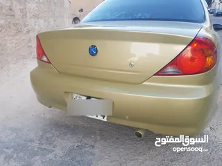  14 كيا سبكتر توماتيك اقساط دفعة 1200 دهان جديد  ماتور جديد  قير جيد  فحص مرفق  مكانيك سيارة مشية ناعمة