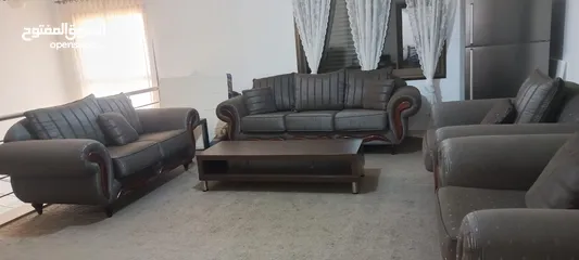  1 طقم كنب خشب ماليزي من الامارات + طاولة تلفزيون