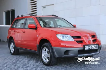  2 متسوبيشي اوتلندر موديل 2005 فحص كامل 7 جيد قاطع مسافه 120 الف كم دهان الشركه مالك اول وبحاله الوكاله