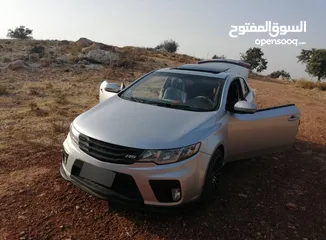  2 كيا فورتي كوبيه 2010 ميوزك من المالك شخصيا لون سيلفر بحالة ممتازة للبيع