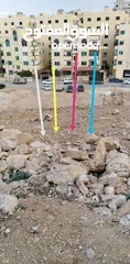  1 قطعة ارض خلف اسكان ماركا حي خالد بن الوليد