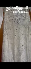  7 فستان عروس أبيض مزين بالشوافريسكي الأصلي