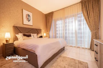  11 دبي لاند SKYCOURT  غرفة وصالة  مفروشة  سوبرلوكس مع بلكونه-إيجار شهري شامل