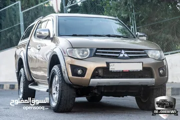  19 Mitsubishi L200 2013   البكب بحالة ممتازة