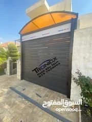  12 ابواب كراج باب اتوماتيك ماتور كراج باب كراج باب محل ماتور ايطالي ماتور باب صيانة باب كراج