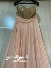  7 فستان حفلة مشمشي و ذهبي