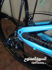  4 بسكليت جنط 26 لون ازرق قابل للطوي بحاله الوكاله ولا خدش مع الكفاله 1 سنه إقرأ الوصف bike