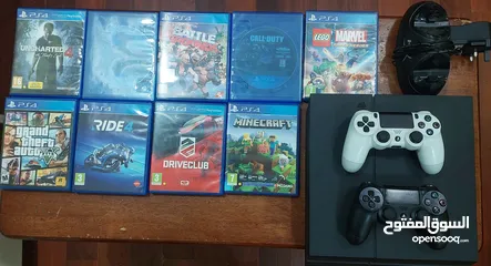  1 PlayStation 4 1TB with games nd controller nd charger