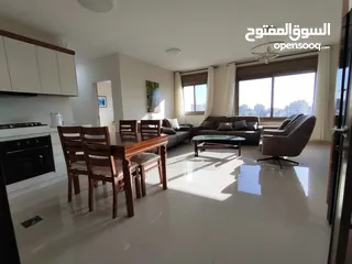  2 شقة للإيجار – عين منجد  طابق خامس بإطلالة مميزة قرب مطعم تغميسة