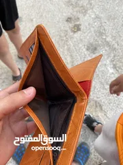  4 محفظه رجاليه فخمه فقط بثلث دنانير