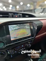  18 تويوتا هايلكس S-GLX اعلى المواصفات باللون الابيض المميز 2024