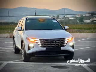  1 هونداي توسان 2023/ فل الفل فتحة سقف بانوراما  2x4 ///240Hp بنزين + كهرباء  ( Haybrid) 1600cc