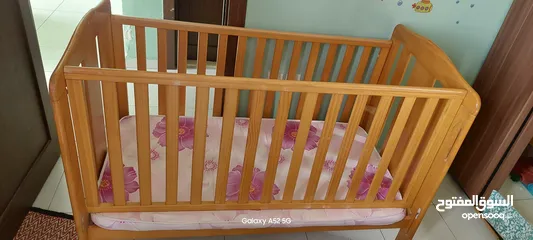  1 Baby crib with mattress