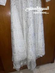  4 فستان عروس أبيض مزين بالشوافريسكي الأصلي
